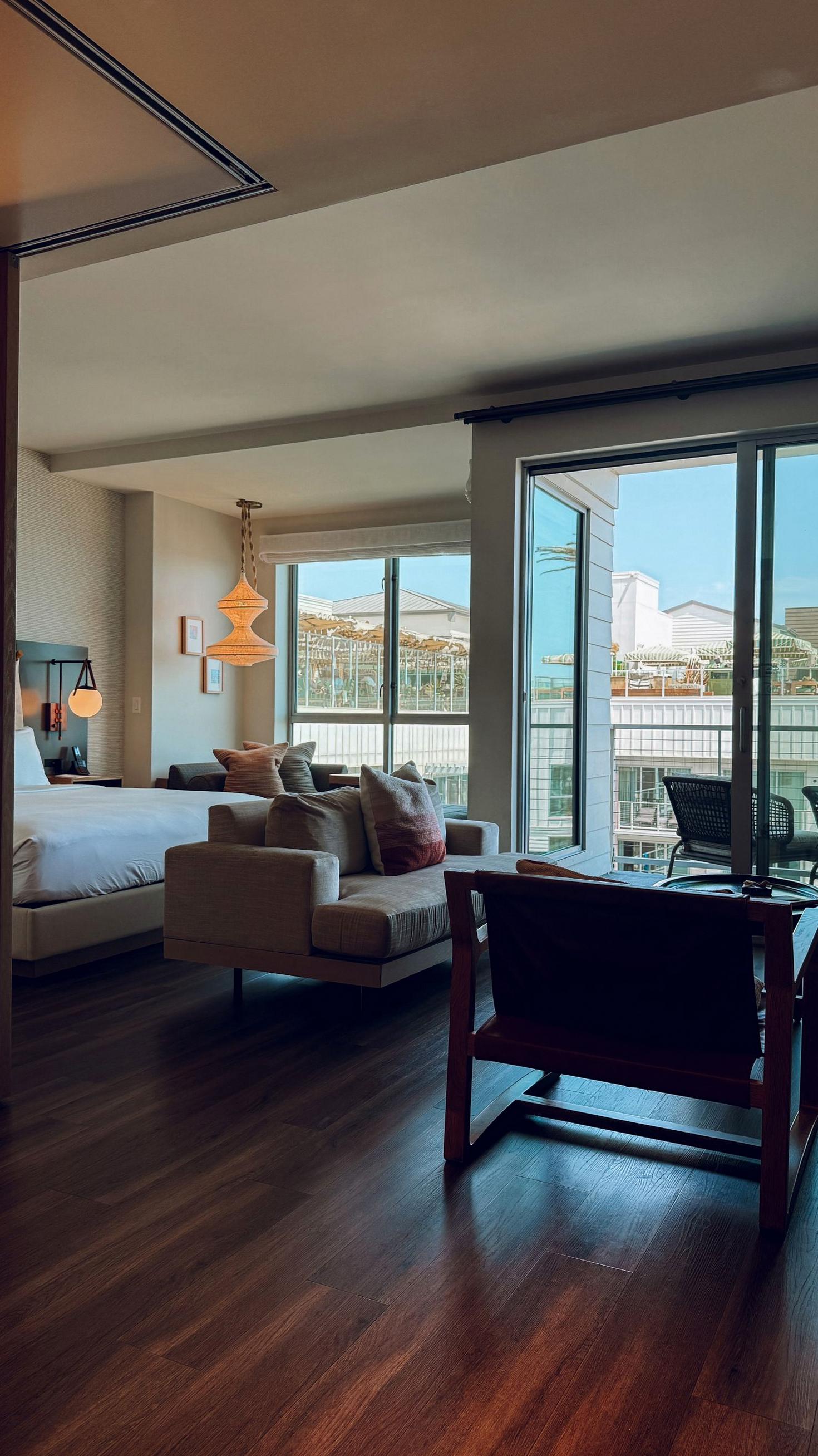 Cozy modern hotel room with city view at Vibeziva Hotel